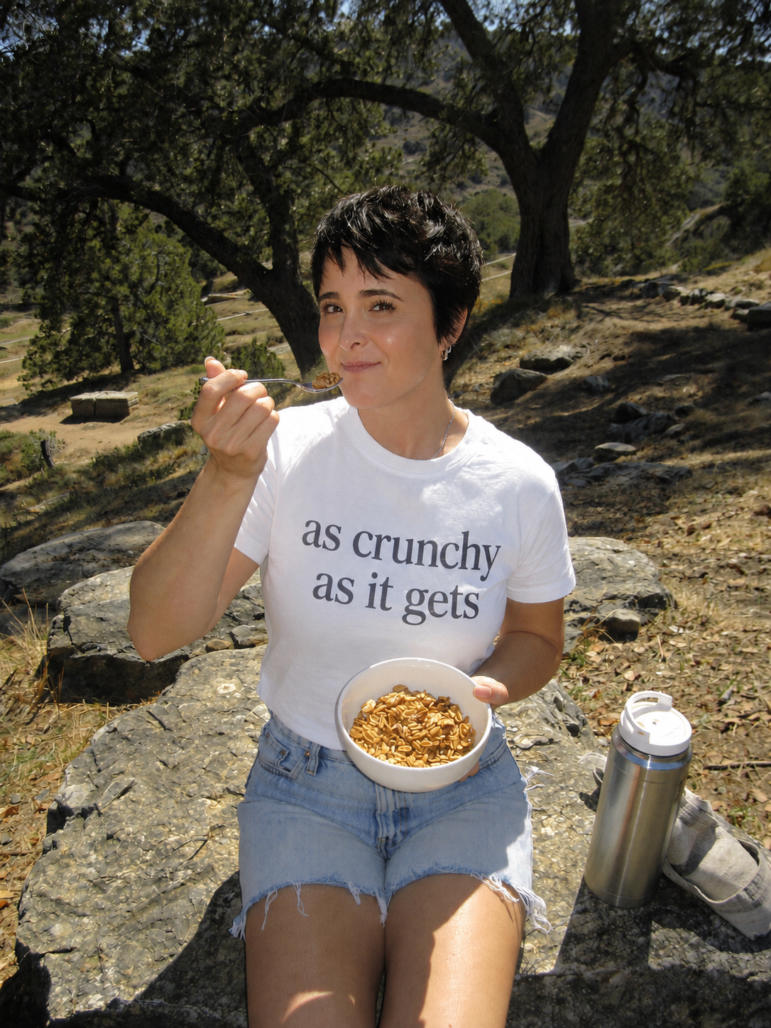 Kelly Blackwell outdoors in an 'as crunchy as it gets' tee